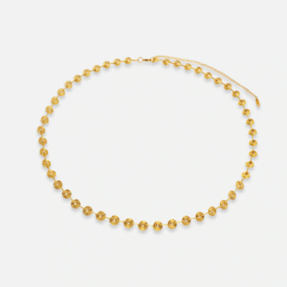 Close-up of the Golden Spiral Belly Chain, featuring sleek gold spiral accents on a stainless steel chain plated with 18K gold.