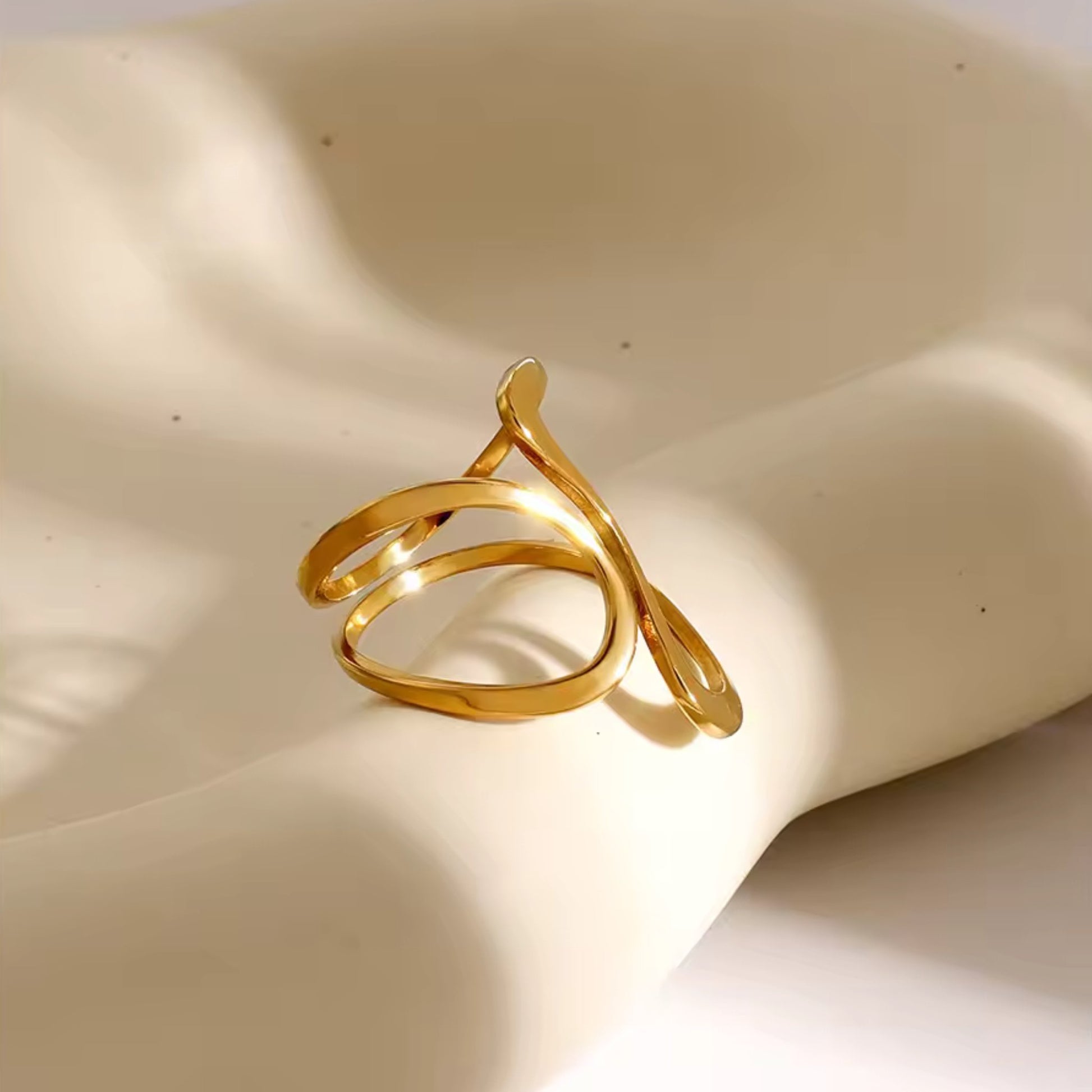 Side profile of the Flowing Elegance Double Layer Curve Ring, emphasizing its unique fluid curves and minimalist aesthetic.