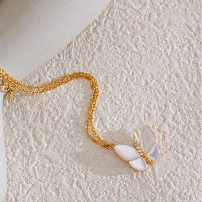 Side View of Butterfly Pendant Highlighting Shell Wings