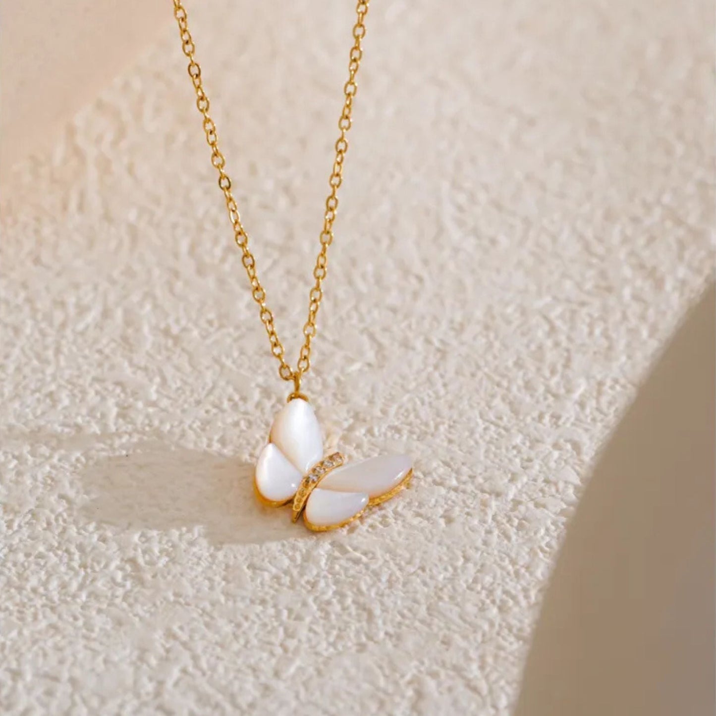 Close-Up of Butterfly Necklace with Zircon Detailing