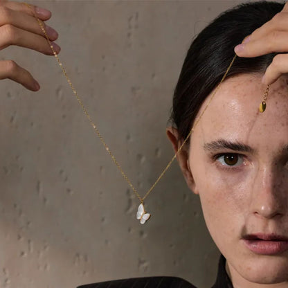 Elegant Butterfly Pendant Necklace Worn by Model