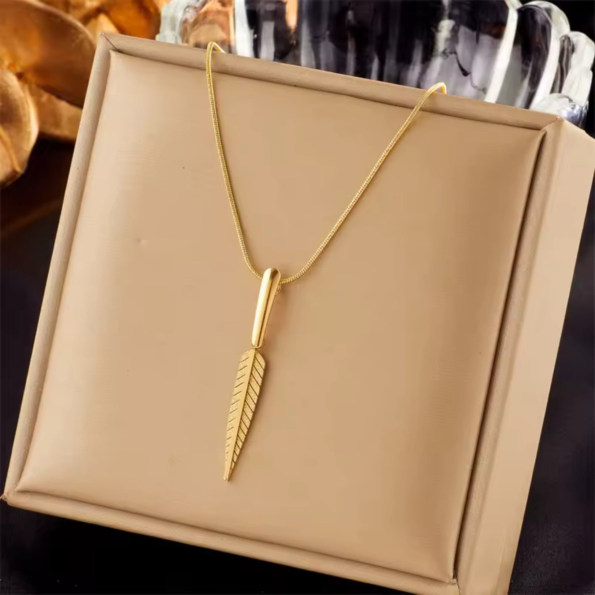Golden Feather Pendant Necklace