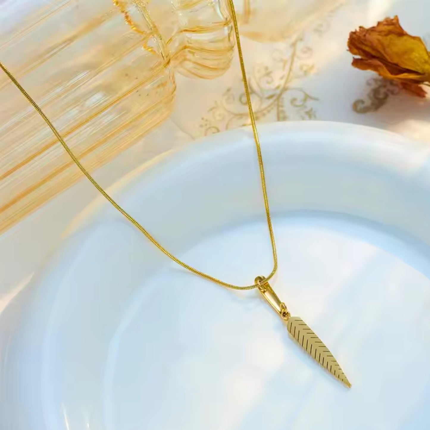 Golden Feather Pendant Necklace