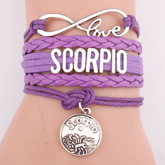 Model Wearing the Horoscope Braided Leather Bracelet for Women. Comes in 12 options