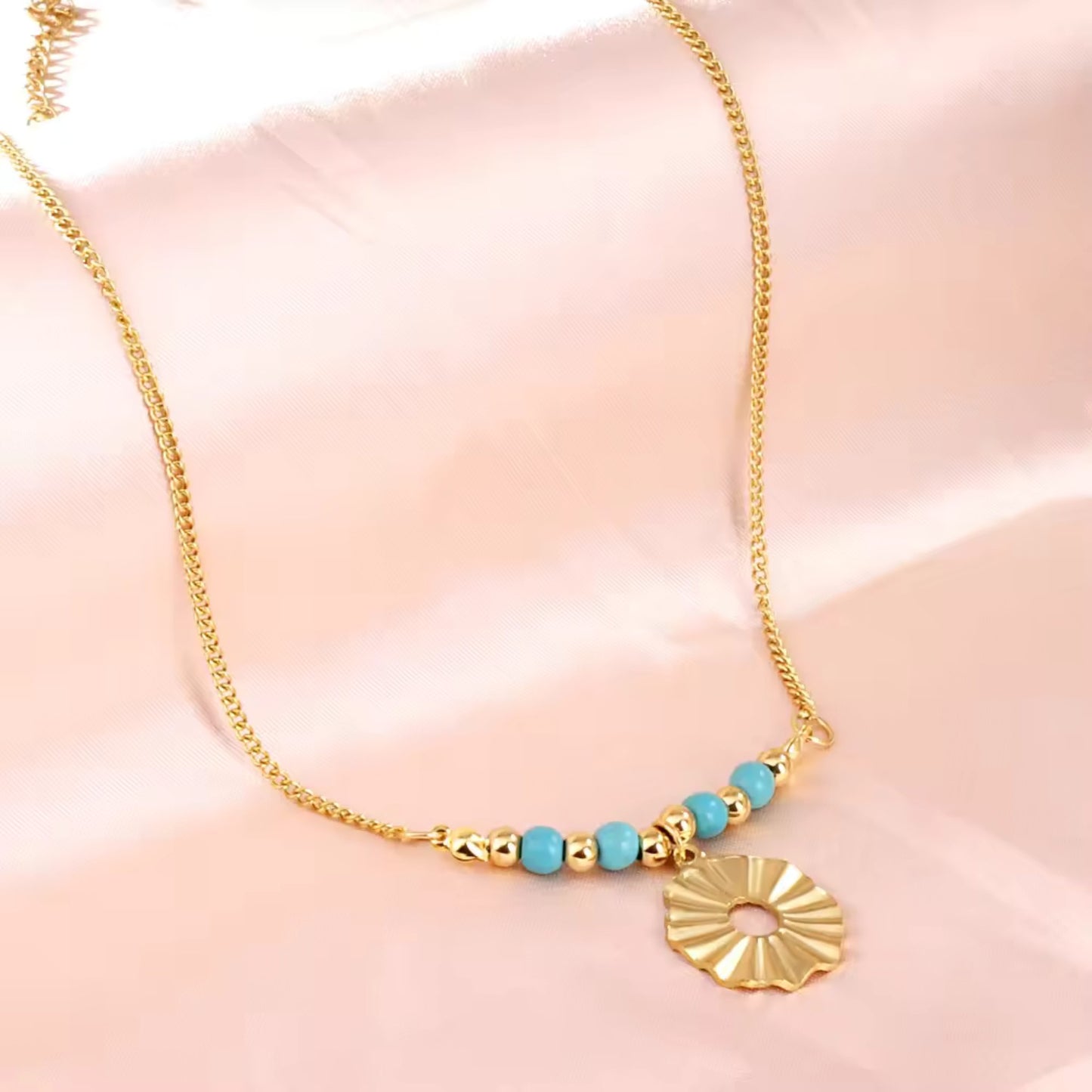 Turquoise Beaded Sunburst Pendant Necklace